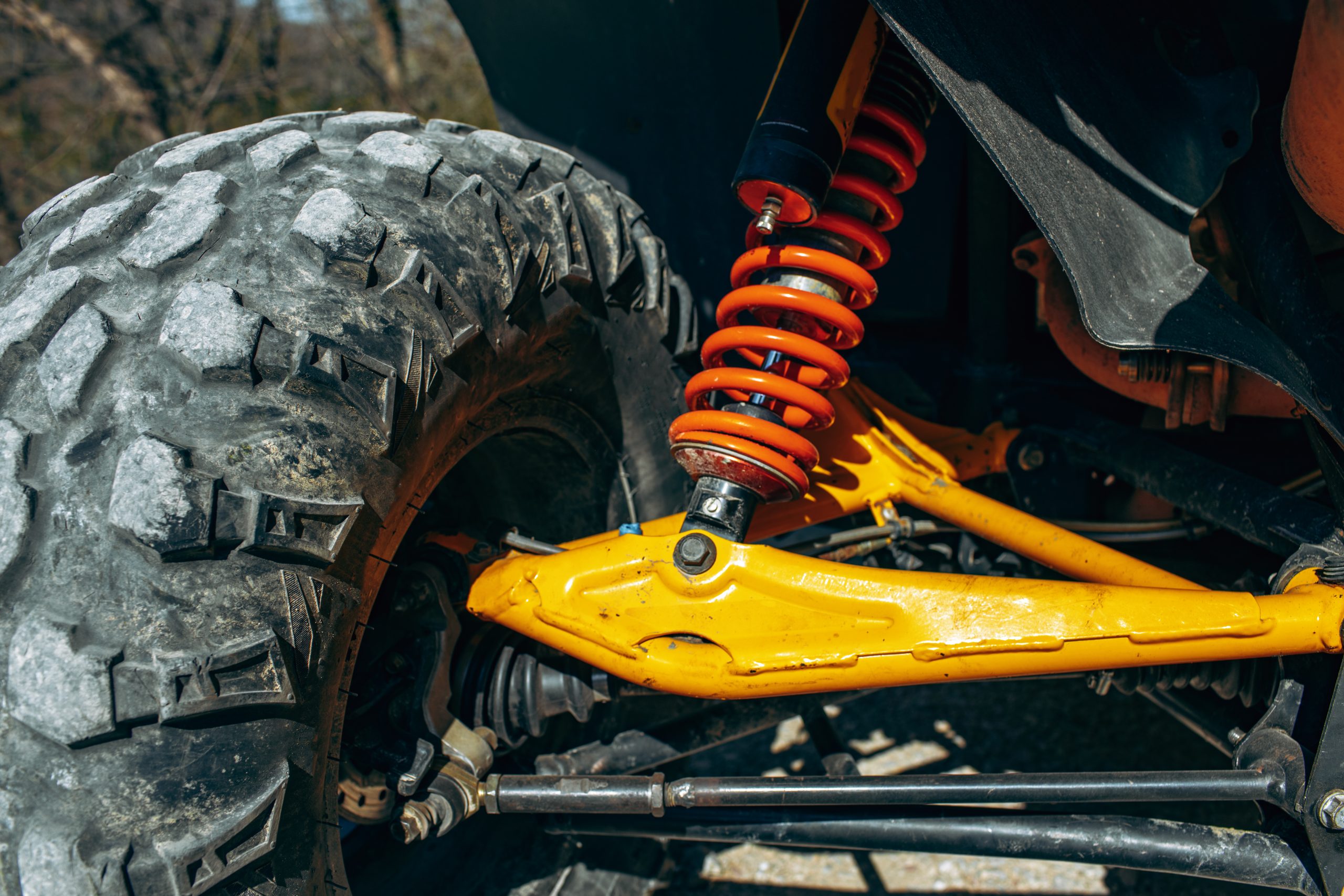 Shock absorber of ATV car close up photo